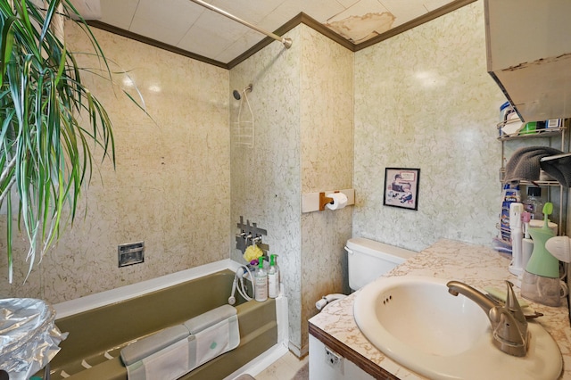 383 Main St, Pittsfield, ME 04967 - bathroom featuring ornamental molding, vanity, washtub / shower combination, and toilet