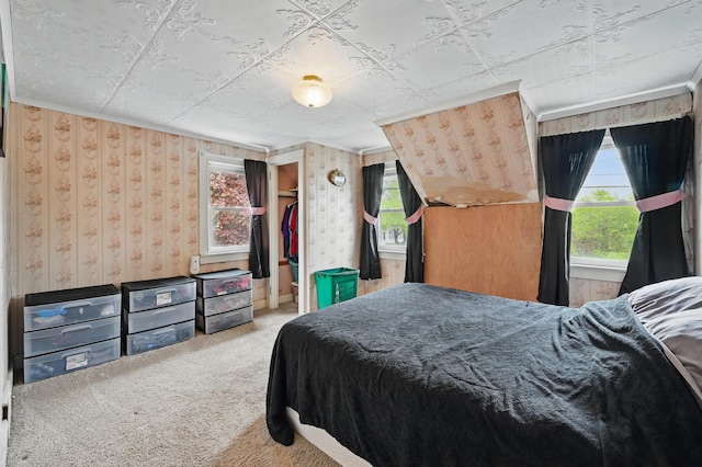 383 Main St, Pittsfield, ME 04967 - bedroom with carpet flooring, multiple windows, and wallpapered walls