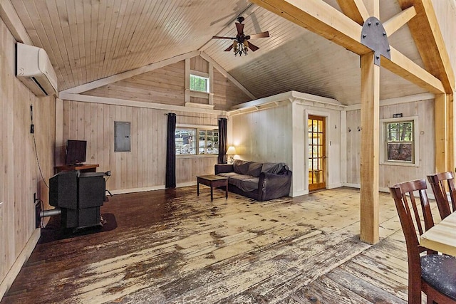 16 Trillium Ests, Rome, ME 04963 - living room featuring an AC wall unit, wood-type flooring, wood walls, electric panel, and a ceiling fan