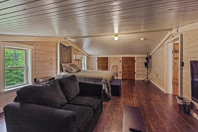 16 Trillium Ests, Rome, ME 04963 - bedroom with lofted ceiling, wood walls, and wood-type flooring