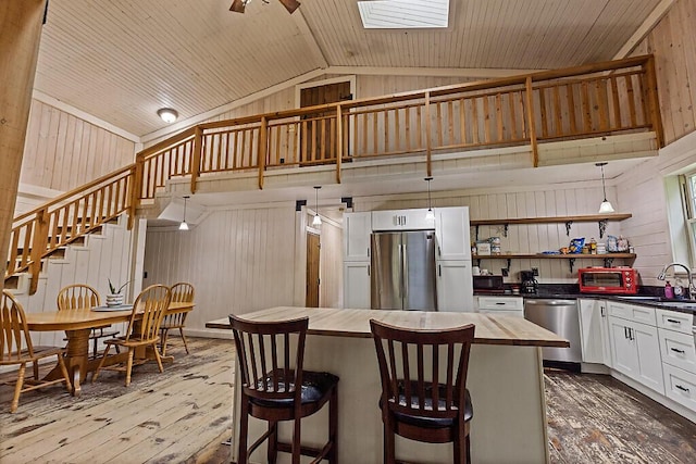 16 Trillium Ests, Rome, ME 04963 - kitchen with stainless steel appliances, dark wood-type flooring, wood counters, open shelves, and a sink