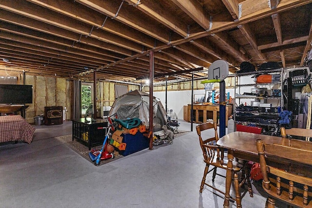 16 Trillium Ests, Rome, ME 04963 - basement with a wood stove