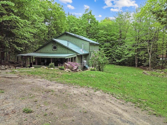 16 Trillium Ests, Rome, ME 04963 - chalet / cabin featuring a front yard and a view of trees