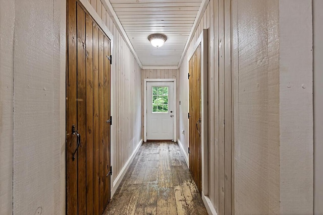 16 Trillium Ests, Rome, ME 04963 - corridor with hardwood / wood-style flooring, baseboards, and wood walls