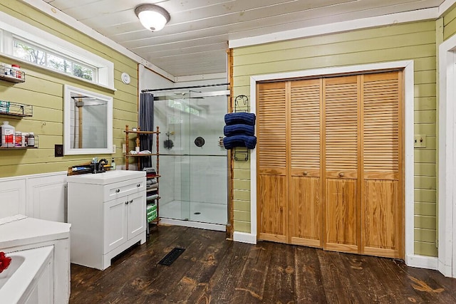 16 Trillium Ests, Rome, ME 04963 - full bathroom with wood walls, a stall shower, hardwood / wood-style floors, and vanity
