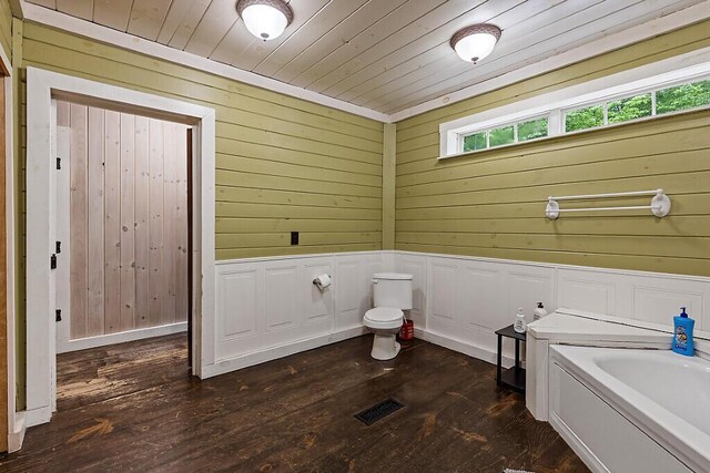 16 Trillium Ests, Rome, ME 04963 - bathroom with healthy amount of natural light, a garden tub, hardwood / wood-style floors, wood ceiling, and wooden walls