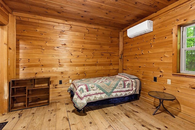 16 Trillium Ests, Rome, ME 04963 - bedroom featuring an AC wall unit, wooden ceiling, hardwood / wood-style flooring, and wood walls