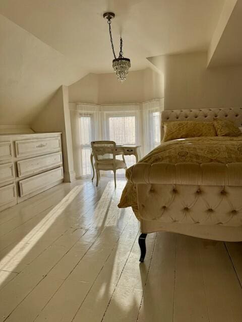 1 Forest St, Dover-Foxcroft, ME 04426 - bedroom featuring lofted ceiling and wood finished floors