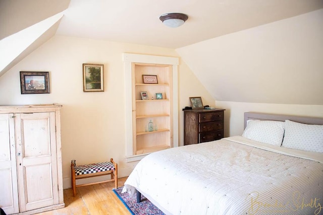1 Forest St, Dover-Foxcroft, ME 04426 - bedroom featuring light wood-style flooring and lofted ceiling
