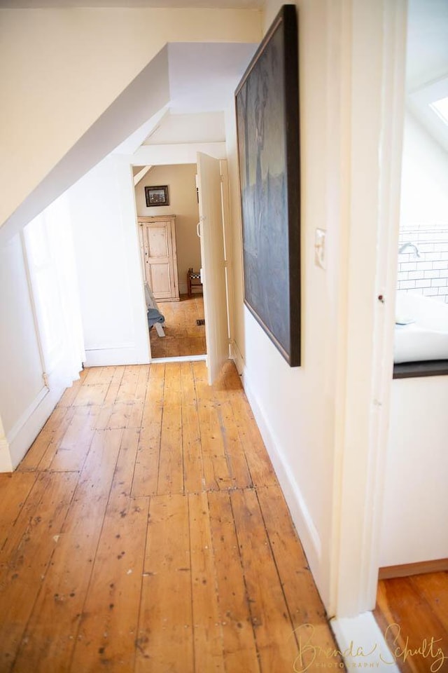 1 Forest St, Dover-Foxcroft, ME 04426 - hallway featuring light wood finished floors and a sink
