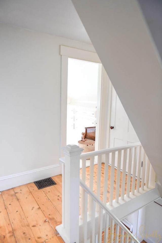 1 Forest St, Dover-Foxcroft, ME 04426 - staircase with wood-type flooring and baseboards
