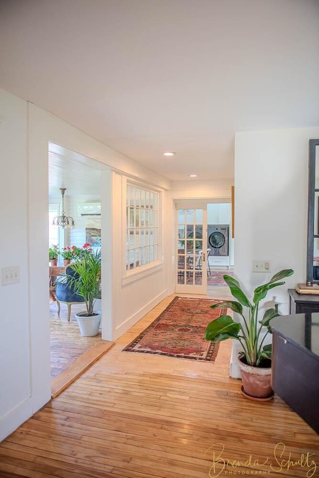 1 Forest St, Dover-Foxcroft, ME 04426 - hall with hardwood / wood-style floors, french doors, recessed lighting, and healthy amount of natural light