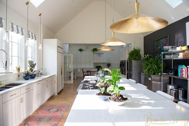 1 Forest St, Dover-Foxcroft, ME 04426 - dining area featuring a skylight and high vaulted ceiling