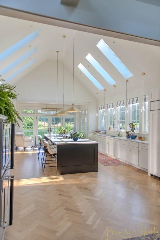 1 Forest St, Dover-Foxcroft, ME 04426 - sunroom with a skylight, lofted ceiling, and french doors
