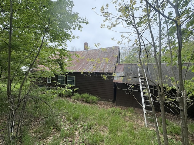 15 Sawyer Ln, Sanford, ME 04083 - back of property featuring metal roof and a barn