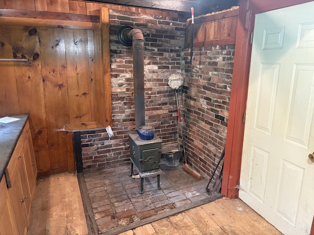 15 Sawyer Ln, Sanford, ME 04083 - detailed view of wood finished floors and a wood stove