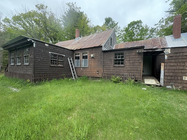 15 Sawyer Ln, Sanford, ME 04083 - back of house featuring a chimney