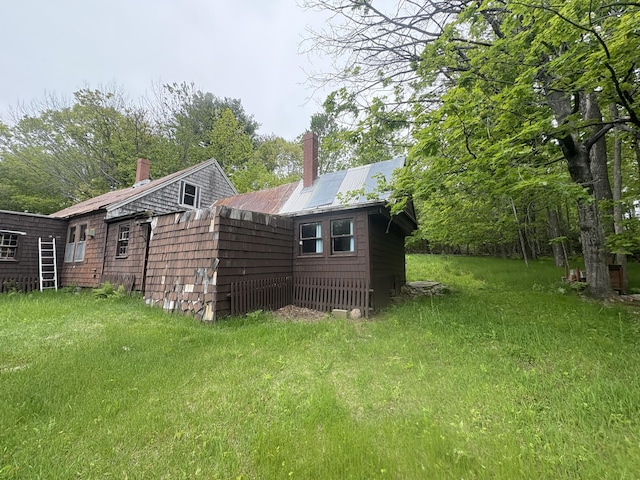 15 Sawyer Ln, Sanford, ME 04083 - view of side of property featuring a chimney