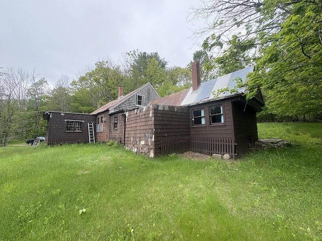 15 Sawyer Ln, Sanford, ME 04083 - view of home's exterior featuring a chimney