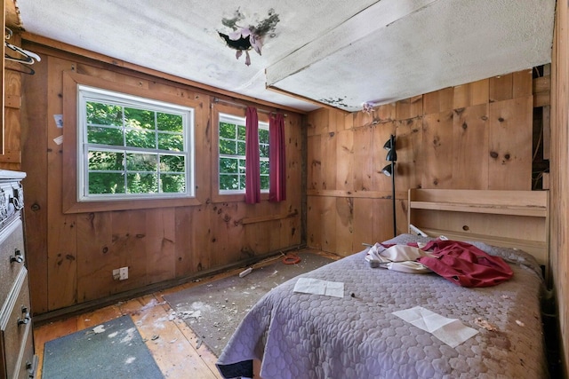 15 Sawyer Ln, Sanford, ME 04083 - bedroom with wooden walls and a textured ceiling