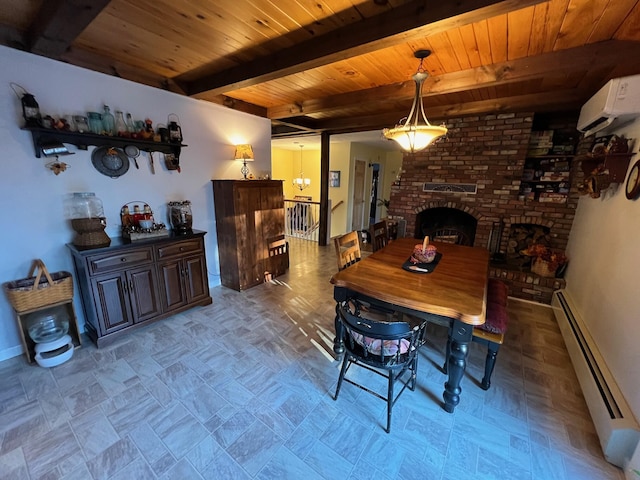 186 Clark Rd, Albion, ME 04910 - dining area with a baseboard heating unit, wooden ceiling with exposed beams, a fireplace, an AC wall unit, and baseboards