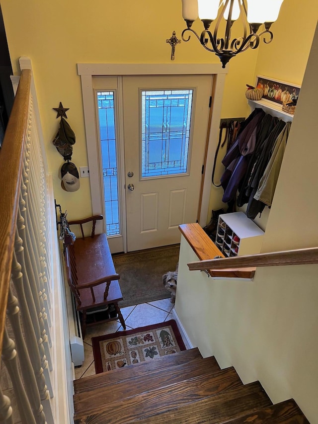 186 Clark Rd, Albion, ME 04910 - tiled entrance foyer featuring a chandelier and carpet