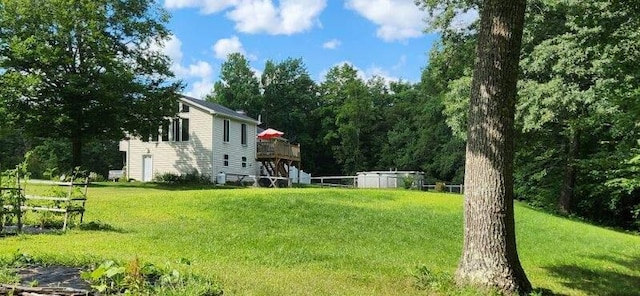 186 Clark Rd, Albion, ME 04910 - view of green lawn featuring a wooden deck