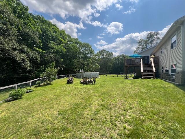 186 Clark Rd, Albion, ME 04910 - view of yard featuring stairs and a wooden deck