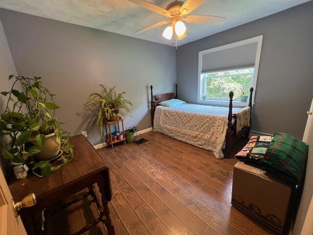 186 Clark Rd, Albion, ME 04910 - bedroom featuring wood finished floors and a ceiling fan