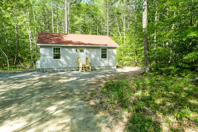 160 Maplewood Dr, Naples, ME 04055 - view of outdoor structure featuring entry steps and a forest view