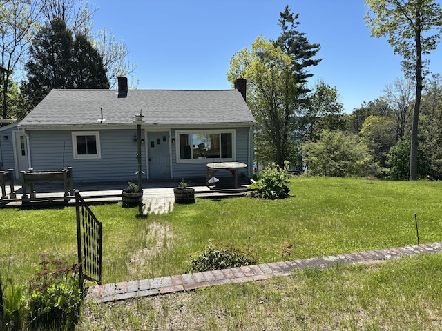 16 Bayview Rd, Falmouth, ME 04105 - back of property featuring a chimney, a lawn, and roof with shingles