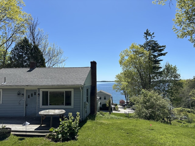16 Bayview Rd, Falmouth, ME 04105 - back of property featuring a chimney, a yard, and a water view