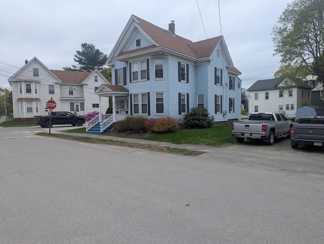 35 Brimmer St, Brewer, ME 04412 - townhome / multi-family property with a chimney
