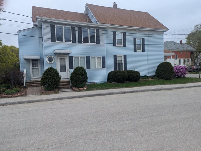 35 Brimmer St, Brewer, ME 04412 - view of property with roof with shingles, a chimney, and entry steps