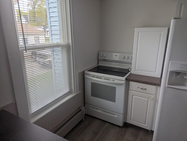 35 Brimmer St, Brewer, ME 04412 - kitchen with white appliances, healthy amount of natural light, a baseboard heating unit, and white cabinets