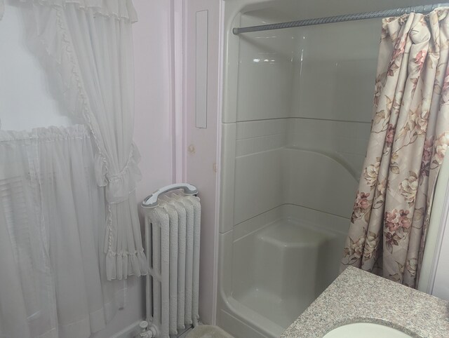 35 Brimmer St, Brewer, ME 04412 - full bathroom featuring radiator, a shower with shower curtain, and vanity
