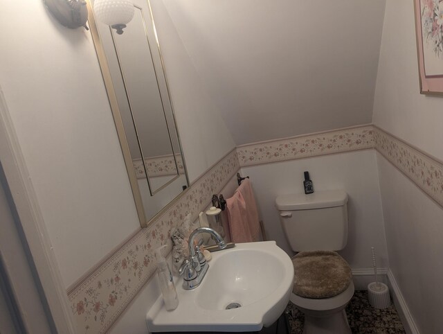 35 Brimmer St, Brewer, ME 04412 - half bath featuring a sink, toilet, and wainscoting