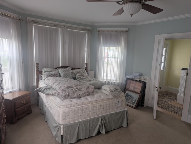 35 Brimmer St, Brewer, ME 04412 - bedroom featuring multiple windows, light colored carpet, ornamental molding, and ceiling fan