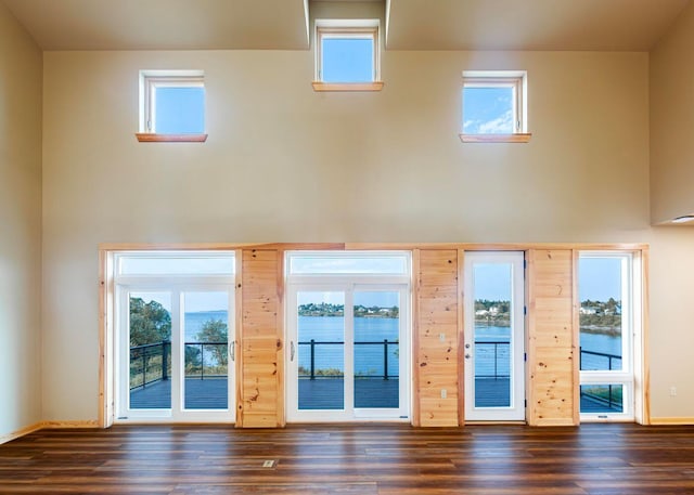 55 Diamond Point Rd, Lubec, ME 04652 - spare room featuring a high ceiling and wood finished floors