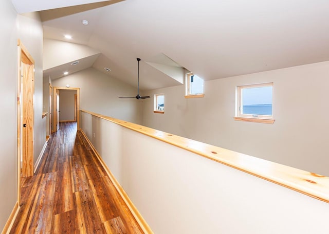 55 Diamond Point Rd, Lubec, ME 04652 - corridor with dark wood-style flooring, lofted ceiling, an upstairs landing, and recessed lighting