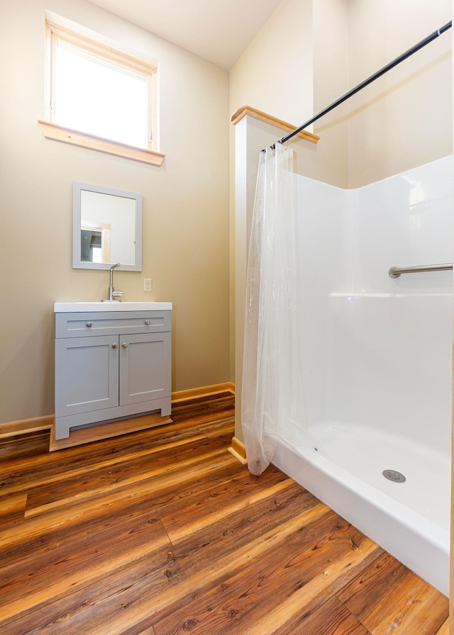55 Diamond Point Rd, Lubec, ME 04652 - bathroom with wood finished floors, vanity, and a shower with shower curtain