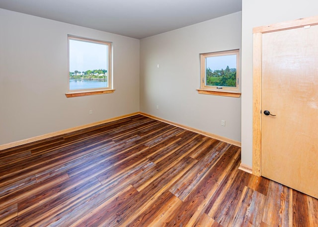 55 Diamond Point Rd, Lubec, ME 04652 - empty room with wood finished floors and baseboards