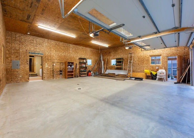 55 Diamond Point Rd, Lubec, ME 04652 - garage with a garage door opener and electric panel