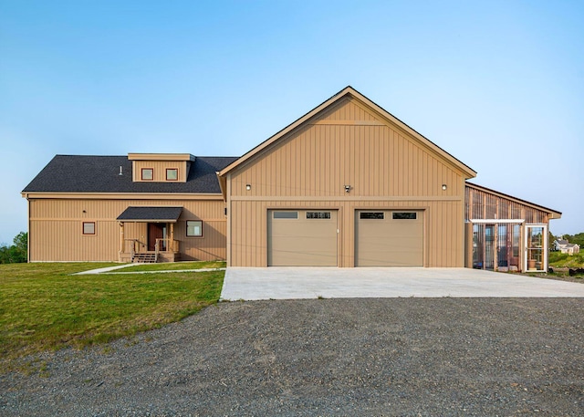 55 Diamond Point Rd, Lubec, ME 04652 - view of front of home featuring a garage and a front yard