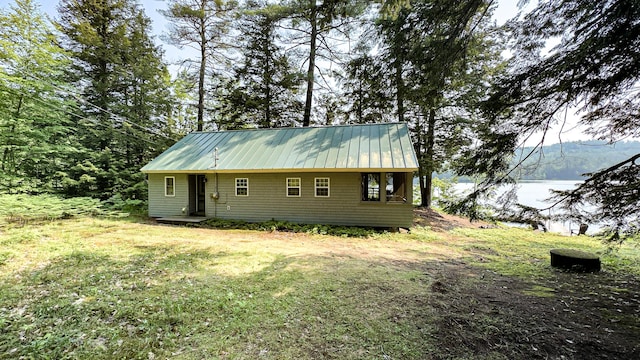 369 Narrow Gauge Trl, Hiram, ME 04041 - view of front of home featuring a metal roof and a front yard