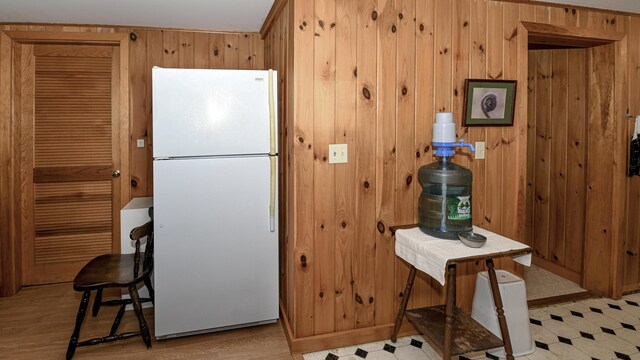369 Narrow Gauge Trl, Hiram, ME 04041 - kitchen with freestanding refrigerator and wooden walls