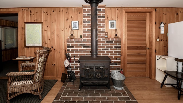 369 Narrow Gauge Trl, Hiram, ME 04041 - detailed view of a wood stove, wood finished floors, and wood walls