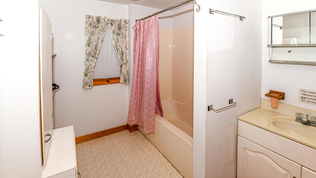 369 Narrow Gauge Trl, Hiram, ME 04041 - full bath with tile patterned floors, vanity, and shower / bath combo with shower curtain