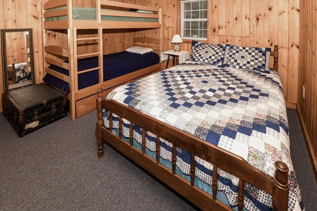 369 Narrow Gauge Trl, Hiram, ME 04041 - bedroom with wood walls and carpet flooring