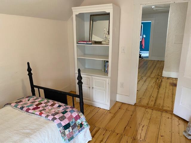 58 Main St, Sangerville, ME 04479 - bedroom with light wood finished floors and baseboards